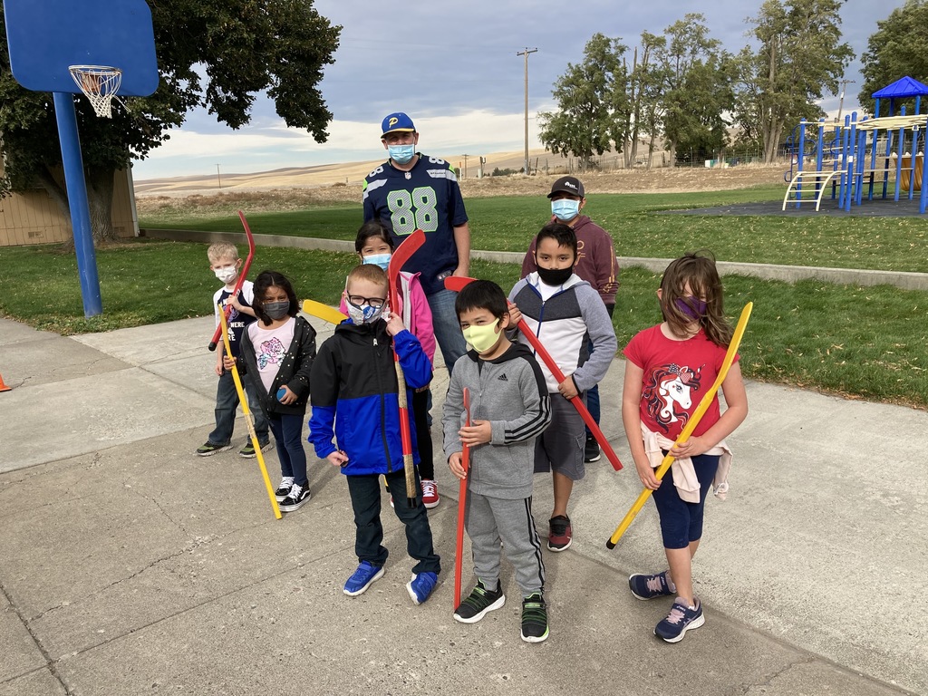Jason Stueckle and his second grade friends playing hockey
